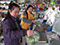 Saleswoman (left) and customer (right) in a retail shop -  DaWangMiaoZhen, Suizhong, Huludao, Liaoning 